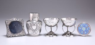 A PAIR OF ARTS AND CRAFTS SILVER SALTS, by Goldsmiths & Sil