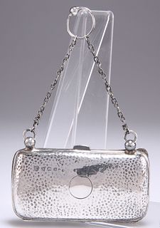 AN EDWARDIAN SILVER PURSE, by Boots Pure Drug Company, Birm