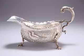 AN USUSAL EDWARDIAN SILVER SAUCEBOAT, by George Nathan & Ri