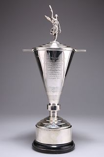 AN ART DECO SILVER TROPHY AND COVER ON STAND, by Walker & H