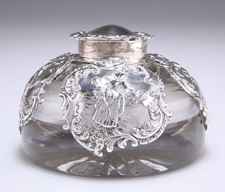 AN EDWARDIAN SILVER-MOUNTED GLASS INKWELL, by William Comyn