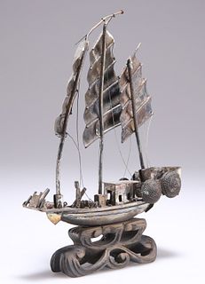 A CHINESE WHITE-METAL MODEL OF A SHIP, CIRCA 1900, with thr