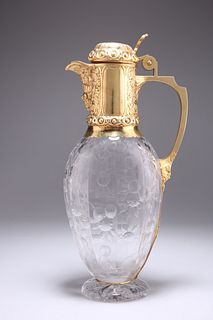 A VICTORIAN SILVER-GILT MOUNTED CUT-GLASS CLARET JUG, by Ch