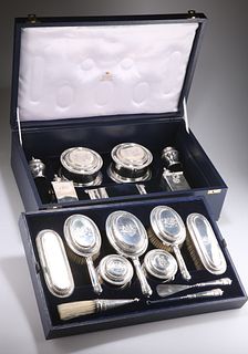 A SPLENDID AND COMPLETE GEORGE V SILVER TOILET SERVICE, by 