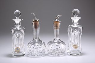 TWO SILVER-TOPPED BRIERLEY GLASS CONDIMENT BOTTLES, the fir