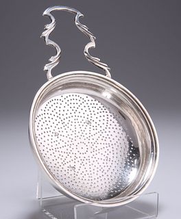A GEORGE III SILVER LEMON STRAINER, probably by Thomas Shep