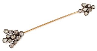 A DIAMOND JABOT PIN, designed as an arrow set with rose-cut