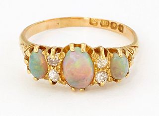 AN 18CT GOLD OPAL AND DIAMOND RING, three oval opals spaced