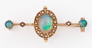 A LATE VICTORIAN BLACK OPAL AND SEED PEARL BROOCH, an oval 