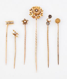 A GROUP OF SIX STICK PINS, including; A DIAMOND AND SEED PE