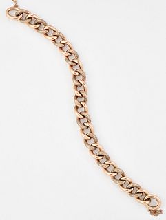 A VICTORIAN FOLIATE ENGRAVED CURB LINK BRACELET, marked '9'