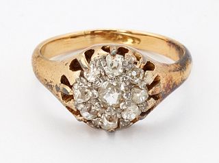 A DIAMOND CLUSTER RING, nine old-cut diamonds in a high cla