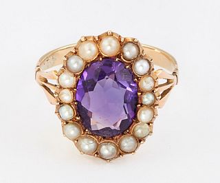 AN AMETHYST AND SPLIT PEARL CLUSTER RING, an oval-cut ameth
