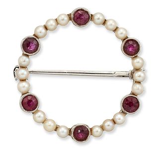 A RUBY AND SEED PEARL BROOCH, hoop form with round-cut rubi