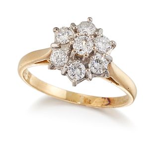 AN 18CT GOLD DIAMOND CLUSTER RING, seven round brilliant-cu