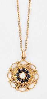 A 9CT GOLD OPAL AND SAPPHIRE PENDANT ON CHAIN, a round opal