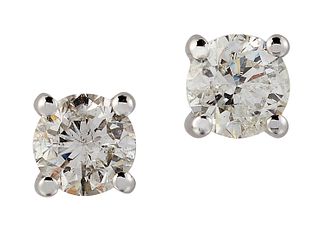 A PAIR OF SOLITAIRE DIAMOND EARRINGS, round brilliant-cut d
