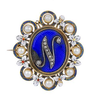 A late Victorian gold enamel pearl and diamond communion brooch. Of oval outline, the central blue g