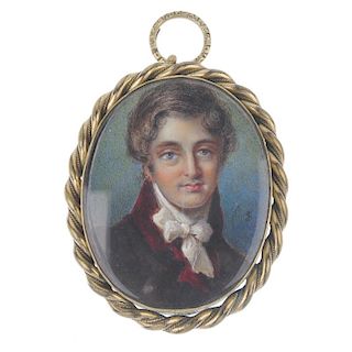 A late 19th century portrait and agate pendant. The hand-painted portrait of a gentleman with red ja