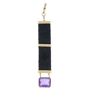 A late Victorian 18ct gold amethyst Albertina fob. Designed as a black ribbon with three gold juncti