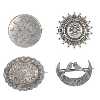 A selection of late 19th to early 20th century silver jewellery. To include a crescent-shape brooch
