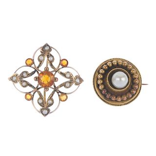 Two early 20th century gold brooches. The first of open circular and scroll shapes, to the central a