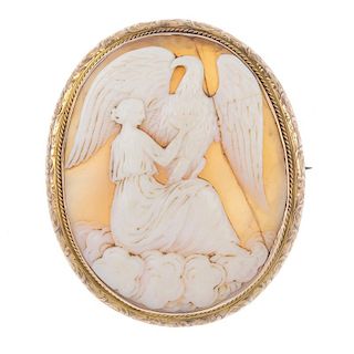 A cameo brooch. The oval cameo depicting Hebe holding a cup for her father Zeus, who is represented
