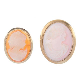 Two cameo brooches. The largest of shell with the profile of a man in relief to the rope twist and p