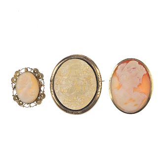 Three cameo brooches. Two carved in shell as typical ladies in profile, the third carved in mother-o