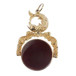 A 9ct gold hardstone swivel fob. Designed as circular bloodstone and carnelian panels to the 9ct gol