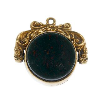 Three hardstone swivel fobs. To include an early 20th century 9ct gold bloodstone and monogram fob,