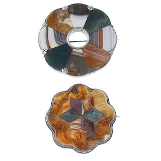 Four Scottish agate brooches. The first of rounded rectangle-shape, the inner panel inlaid with thir
