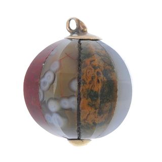 A late 19th century Scottish hardstone orb pendant. Designed as a series of faceted hardstone panels