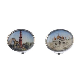 A pair of hand painted international ear clips. Designed as oval panels, hand painted with two diffe