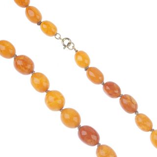 A natural amber necklace. Comprising twenty-seven graduated beads measuring 1.6 to 1.3cms. Length 44