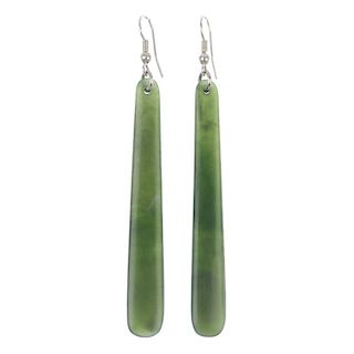 A pair of New Zealand jade ear pendants by Paddy Cooper. Each designed as a elongated pear-shape, to