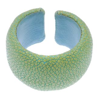 A dyed green stingray cuff. Signed Maximos. Inner diameter 5.1cms. Width 4cms. <br><br>Overall condi