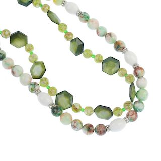 Five gem necklaces. One comprising green glass beads and hexagonal, dyed green mother-of-pearl, anot