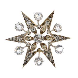 A late 19th century paste star brooch. The cushion-shape paste, to the similarly-set paste star surr