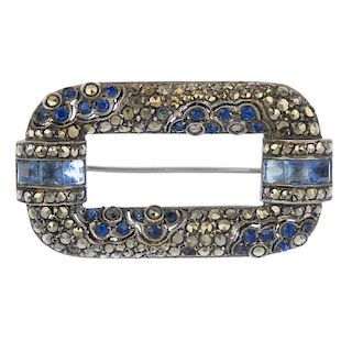 An early 20th century silver marcasite and paste brooch. The rectangular-shape marcasite brooch, wit