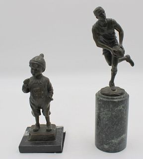 Bronze Rugby Player And A  Bronze Boy Smoking