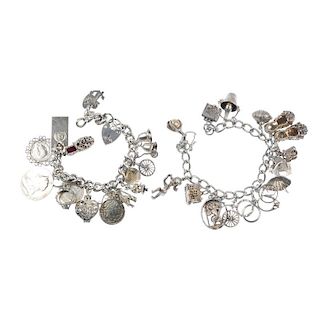 Six charm bracelets. Suspending a total of seventy-one charms, to include a penny farthing bicycle,