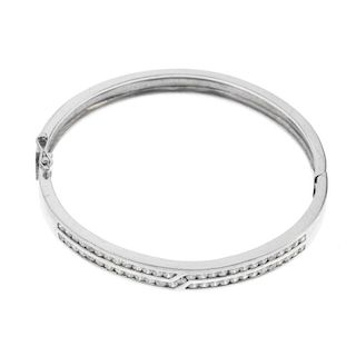 Three silver and white metal items. To include a silver hinged bangle with colourless gem detail, a