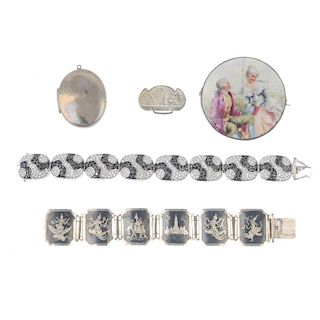 A selection of silver and white metal jewellery. To include a Damascene panelled bracelet, a variety