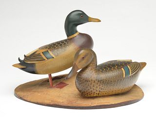 Exceptional pair of decorative 3/4 size mallards mounted on wooden base, Charles Perdew, Henry, Illinois.