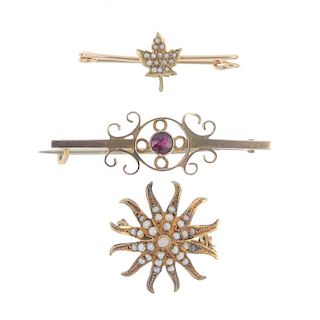 Three brooches. The first designed as a floral design with split pearls set to each narrow petal, th