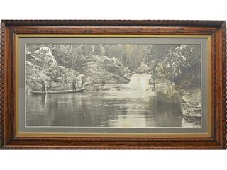 Large and early photo of gentlemen fly fishing in a river's pool.