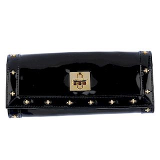LINKS OF LONDON - a travel jewellery roll and purse. The jewellery roll with black patent exterior a