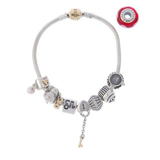 PANDORA - a charm bracelet. The snake-link bracelet, suspending nine charms, to include a cupcake ch