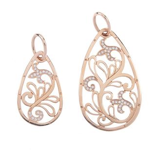 THOMAS SABO - two pendants and a pair of earrings. To include two gold plated pierced floral pattern